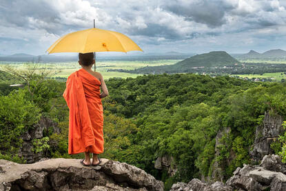 Meditation Portrait of a Buddhist novice contemplating the landscape © Roberto Pazzi