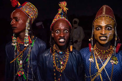 Night Celebrations Sudosukai - Wodaabe people celebrating the Gerewol festival by night Buy Print