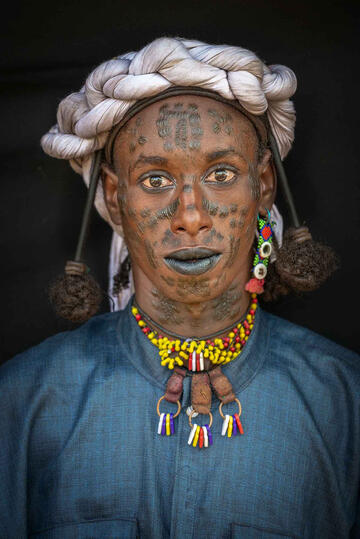 Japto Tribesman Portrait of a Japto - Wodabee tribesman © Roberto Pazzi