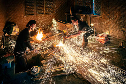 The Keris Blacksmith at work on a keris, traditional dagger dating back to the 9th century © Roberto Pazzi