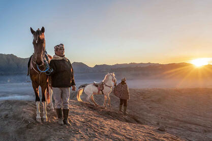 The Sunrise Tengger horsemen on the slopes of the Bromo volcano © Roberto Pazzi