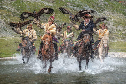 The Ford Kazakh eagle hunters crossing a ford Buy Print