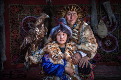 Legacy of Tradition Portrait of a Kazakh eagle hunter with his daugther © Roberto Pazzi