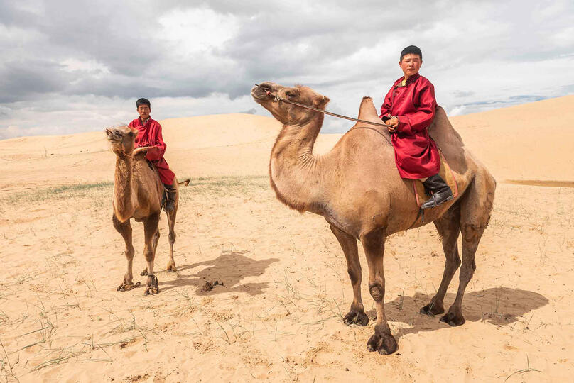 The Young Herders Portrait of young camel herders © Roberto Pazzi