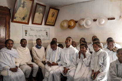 Under the Founders’ Blessing Young 'mpiandry' at the 'toby' revival centers beneath the images of the founding fathers © Roberto Pazzi