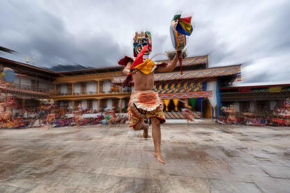Jump of Faith Dancer of the Tshechu during the performance © Roberto Pazzi