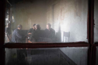 The Window A group of men playing a traditional board game © Roberto Pazzi