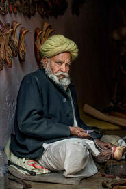 The Shoemaker Portrait of a shoemaker at work © Roberto Pazzi