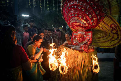 Devotion A moment of the Theyyam, Hindu Shamanic ritualistic dance form © Roberto Pazzi