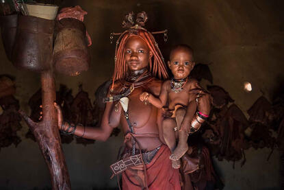 Himba Mother Portrait of a Himba woman with her baby © Roberto Pazzi