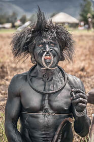 Tribal Smile Portrait of a smiling Dani leader Buy Print