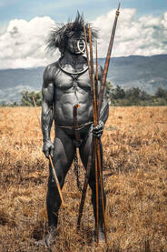 Into the Wild Portrait of a Dani leader in the traditional war attire © Roberto Pazzi