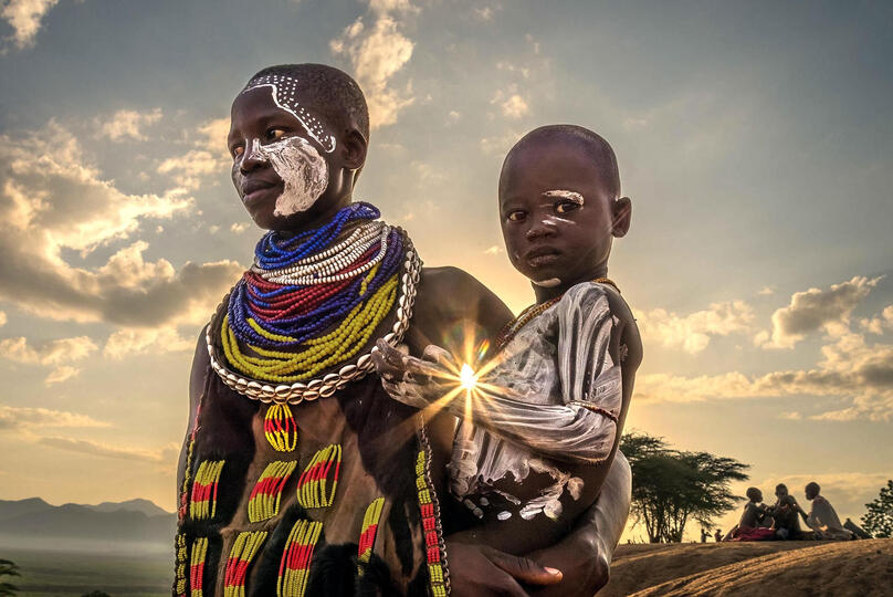 The Family of the Sun Portrait of a Kara woman with her baby Buy Print