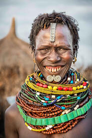 Neckleces and Smile Portrait of a Nyangatom woman © Roberto Pazzi