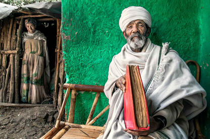 The Priest and the Book Portrait of an Orthodox priest with a holy book © Roberto Pazzi