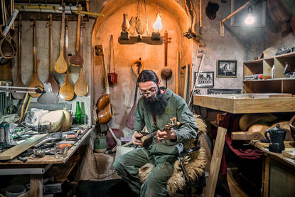 The Luthier Portrait of a young luthier in his workshop © Roberto Pazzi