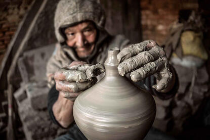 Work and Passion Portrait of an elderly potter at work in his workshop © Roberto Pazzi