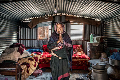 Earthquake Took Everything but my Smile Portrait of an elderly woman living in a temporary sheet metal shack after the awful earthquake of 2015 © Roberto Pazzi