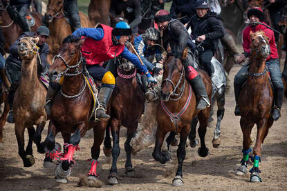 Kupkari The Kupkari, the traditional Central Asian sport in which horse-mounted players attempt to place a goat carcass in a goal © Roberto Pazzi